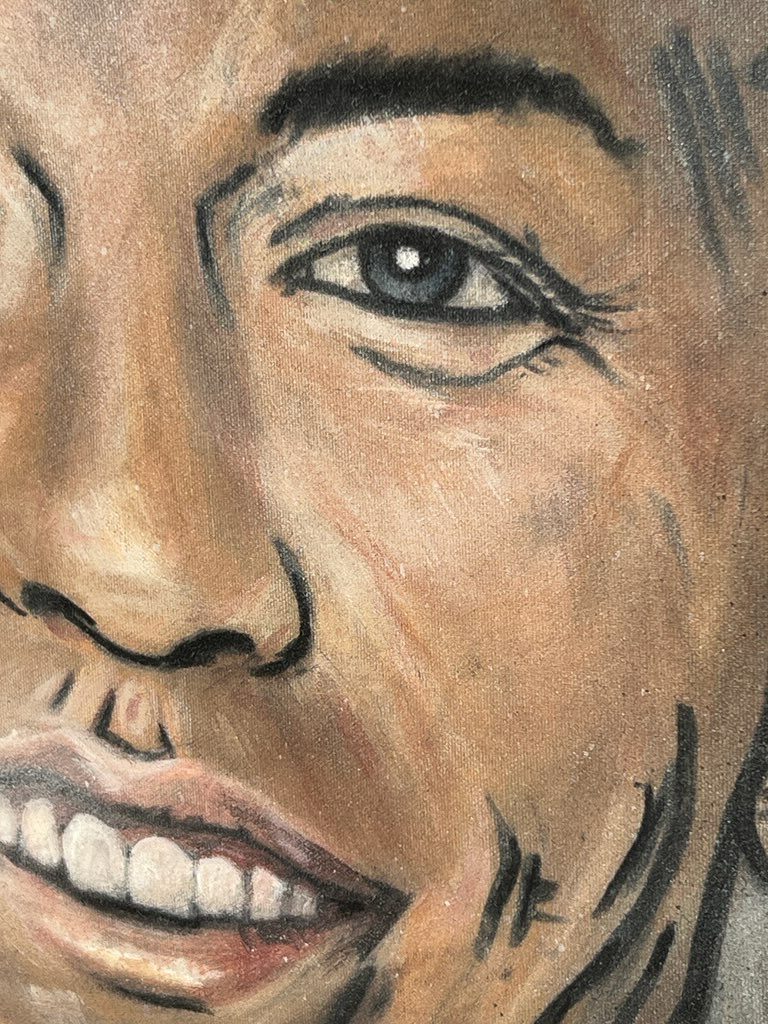 Macro detail of brushwork on a painted portrait