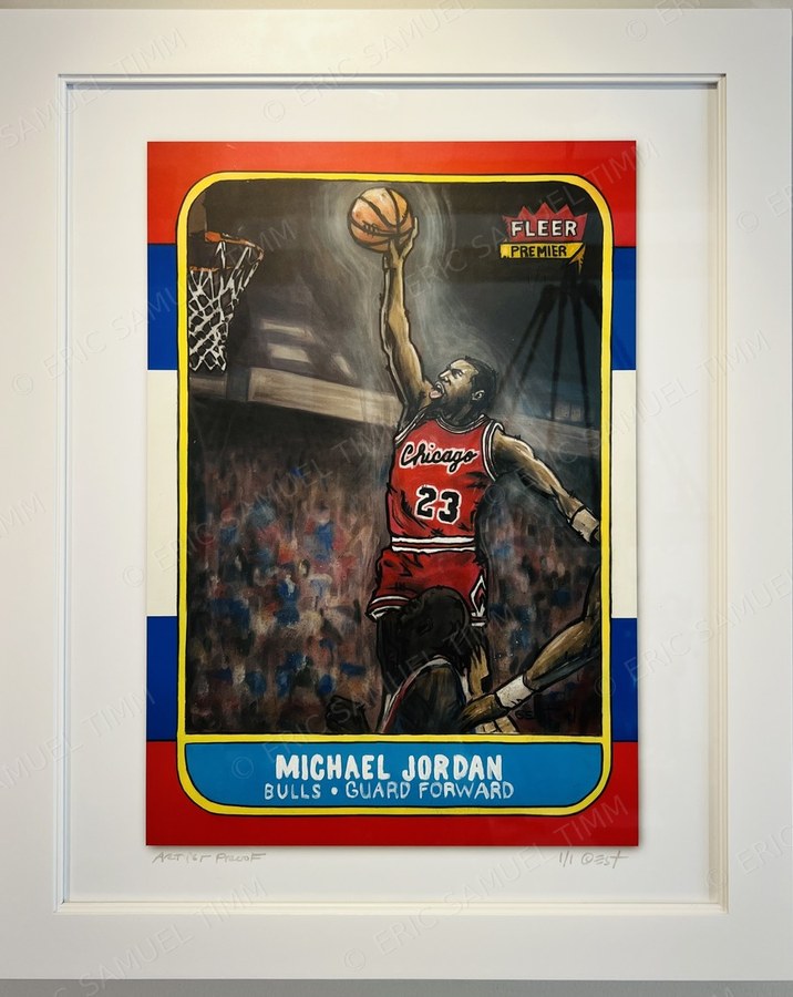The Michael Jordan print, matted and framed on a wall