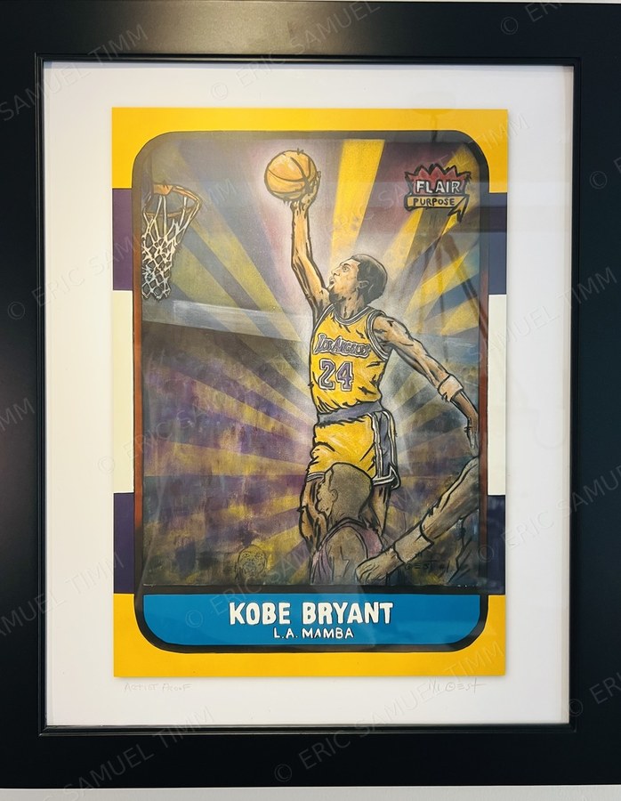 The Kobe Bryant print, matted and framed on a wall